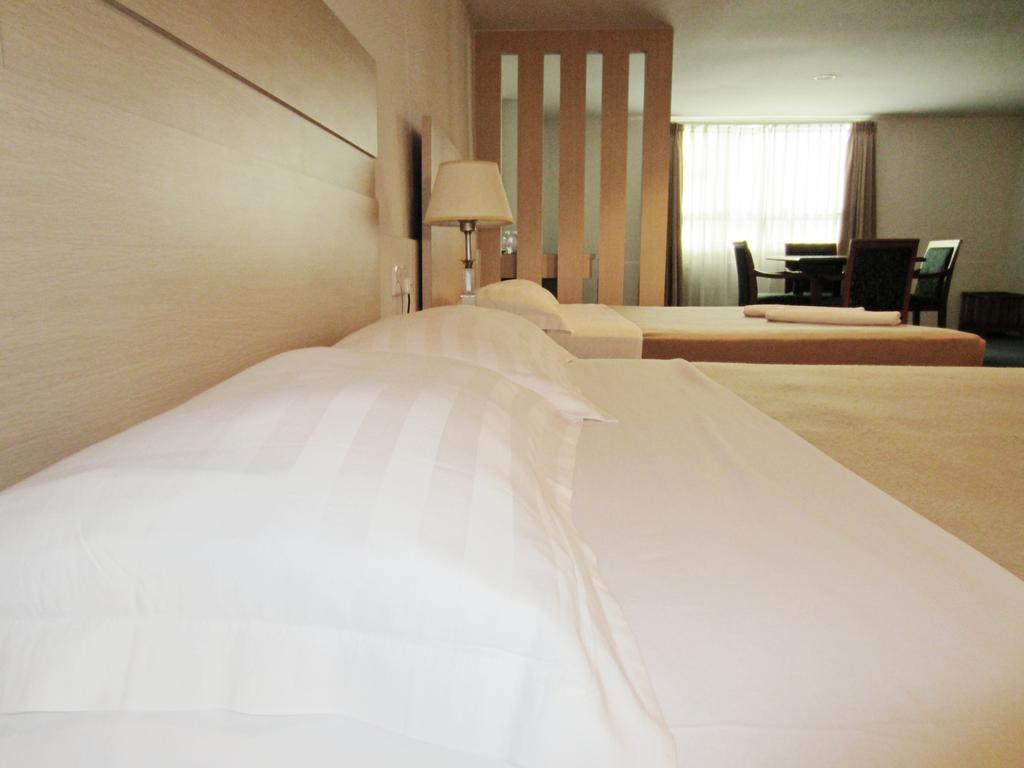 Promenade Service Apartment Кота-Кинабалу Номер фото